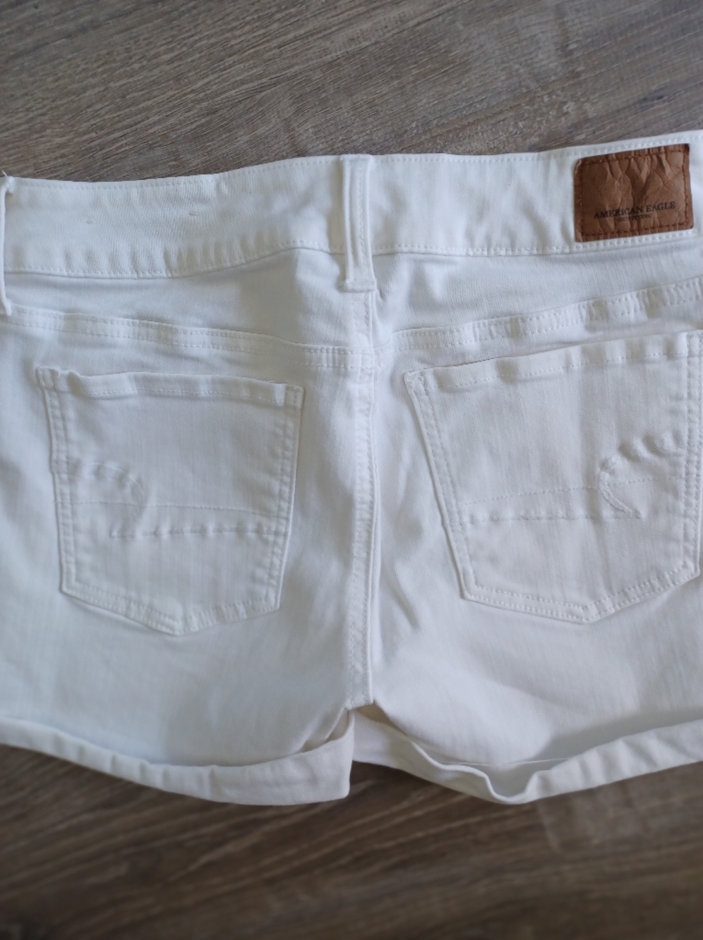 American Eagle Low Rise White Rolled Cuff Midi Denim Shorts - Picture 4 of 5